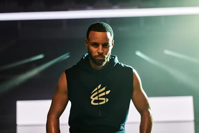 Stephen Curry models Curry Brand apparel.